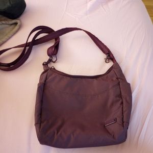 Pacsafe travel crossbody shoulder bag purse RFID blocking adjustable zip top